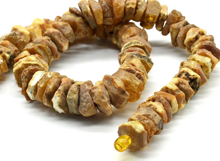 Medical beads made of amber discs 15-18mm color. milk, 74g, 50cm