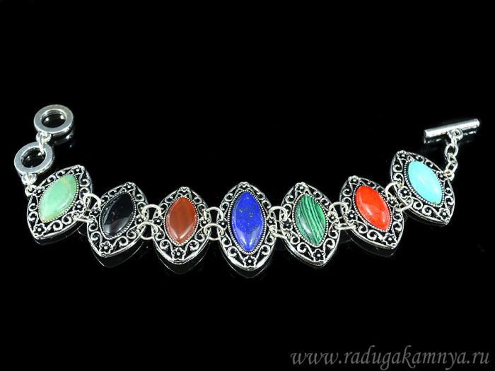 Bracelet on a metal base of 7 beads 33*19mm, 30*19mm with gems, 18, 20cm.