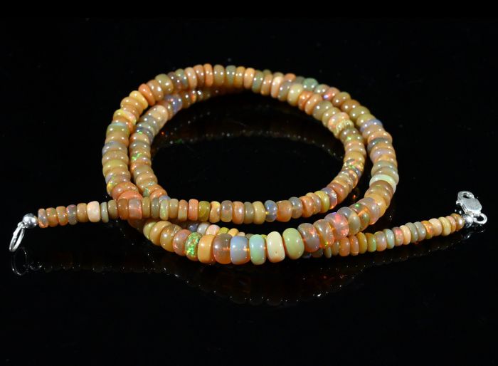 Gold rondel Opal beads for an increase of 43cm, 10.9g