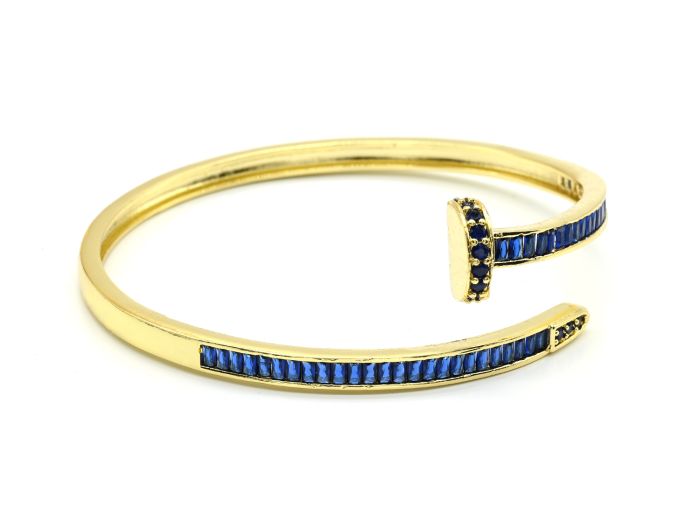 The "Nail" bracelet with zircons is colored sapphire