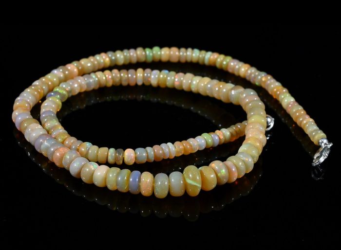 Gold rondel Opal beads for an increase of 42cm, 12.5g