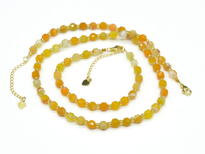 Beads, bracelet made of tinted faceted agate 5*6mm color orange, 44cm, 17cm