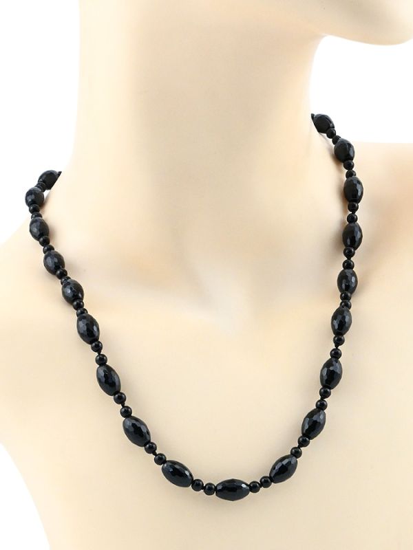 Beads made of black onyx oval gr.8*12mm ball 4mm, 50cm