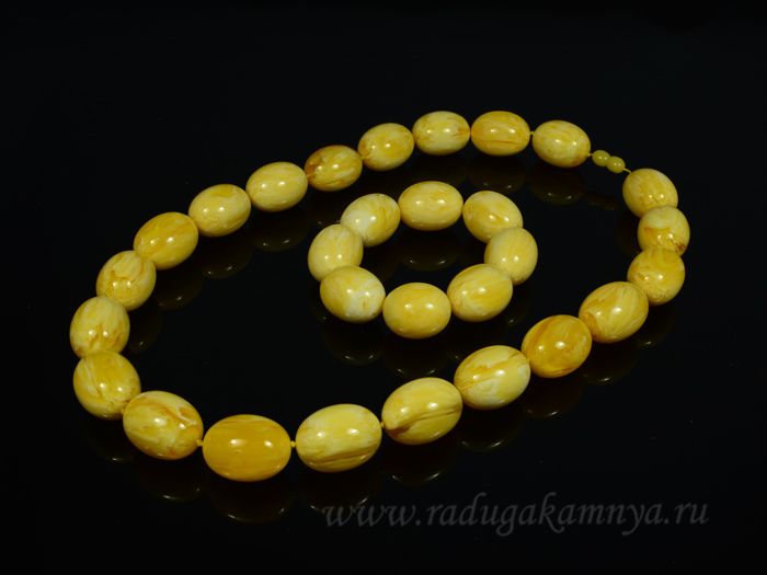 Set of amber beads and bracelet oval 15*23mm milky, 55cm