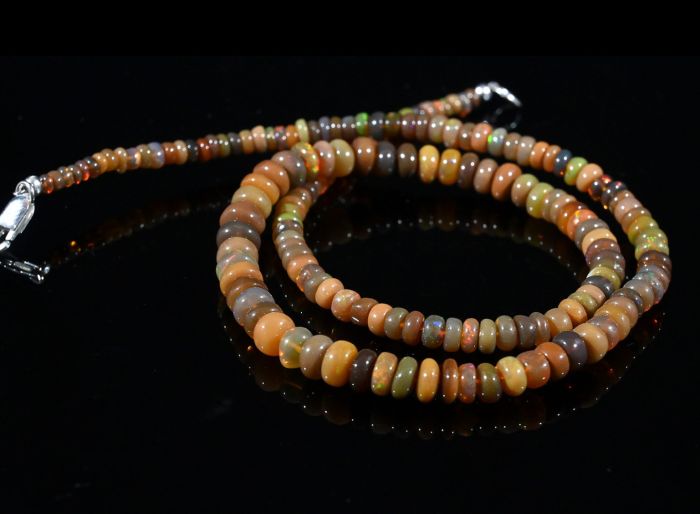 Gold rondel Opal beads for an increase of 44cm, 10.9g