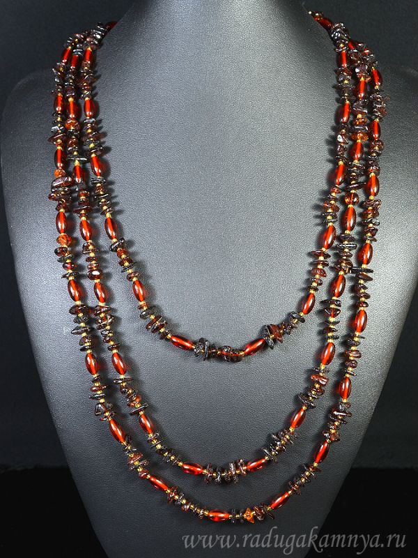 Beads made of amber crumb, oval t.cognac, 200cm