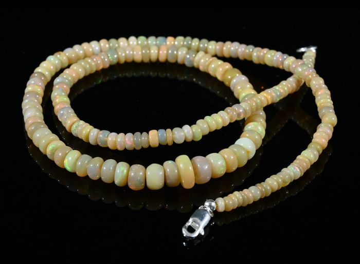 Gold rondel Opal beads for an increase of 45cm, 11.1g