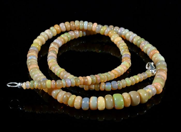 Gold rondel Opal beads for an increase of 43cm, 12.7g